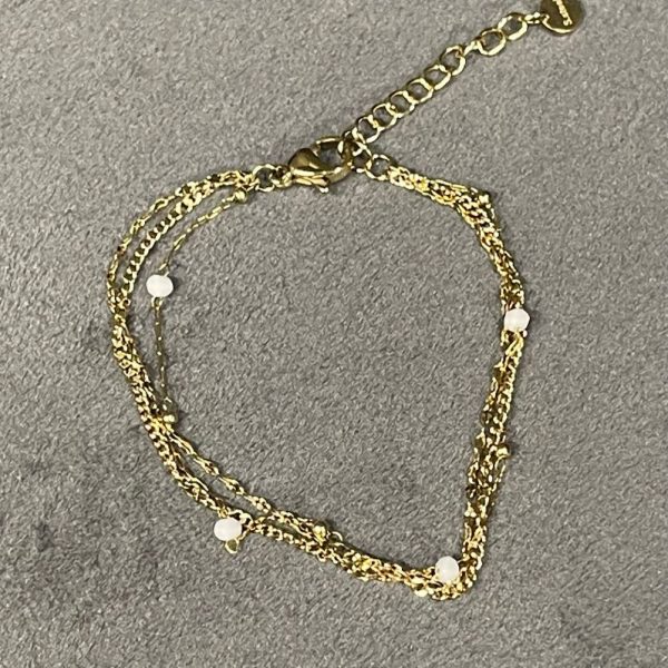 Bracelet triple et boules blanches Bohm